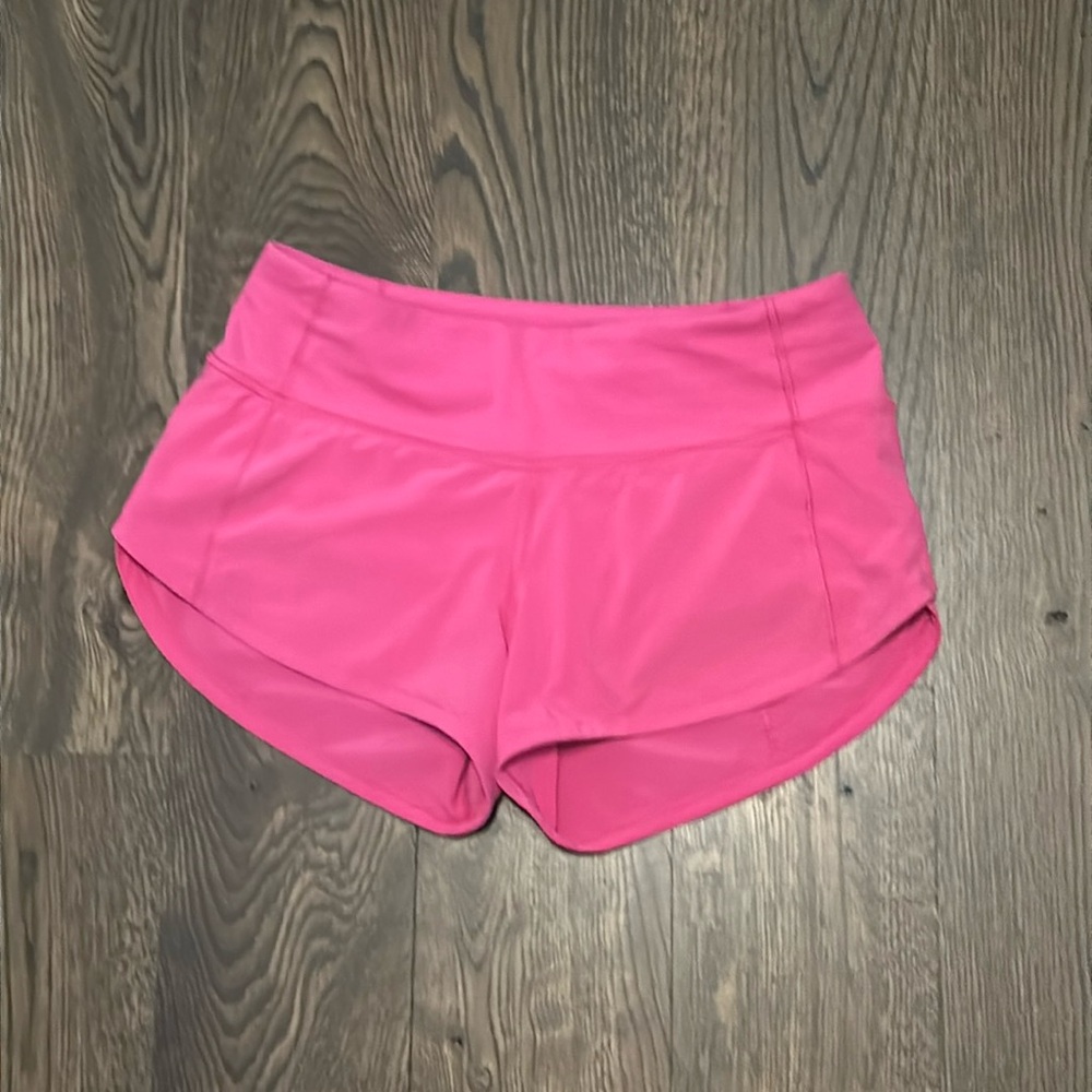 Sonic pink lululemon speed up shorts.
